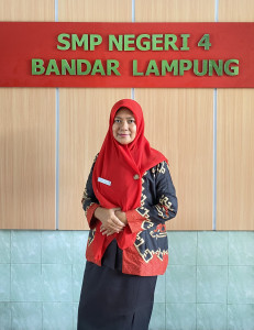 Okfi Erlina, S. Kom