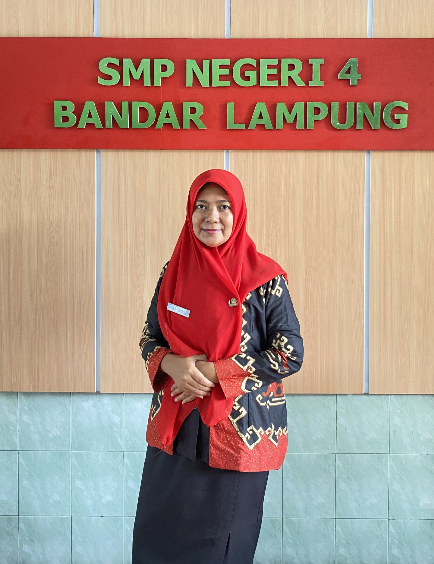 Okfi Erlina, S. Kom